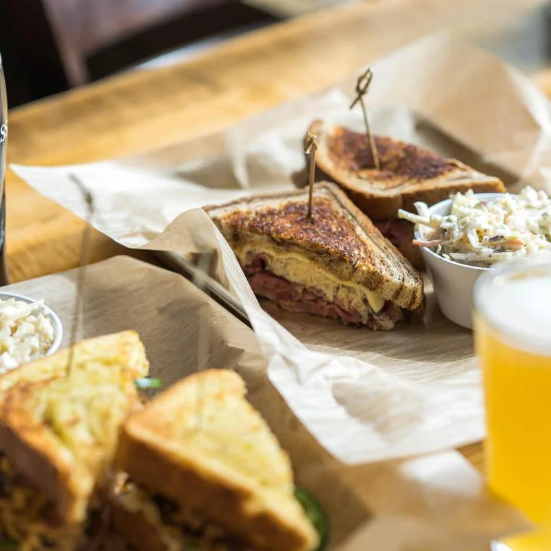 Classic Reuben sandwich with coleslaw on the side