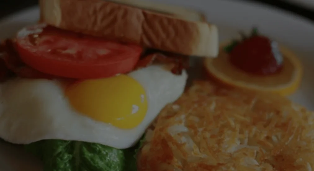 Classic American breakfast with fried egg and toast