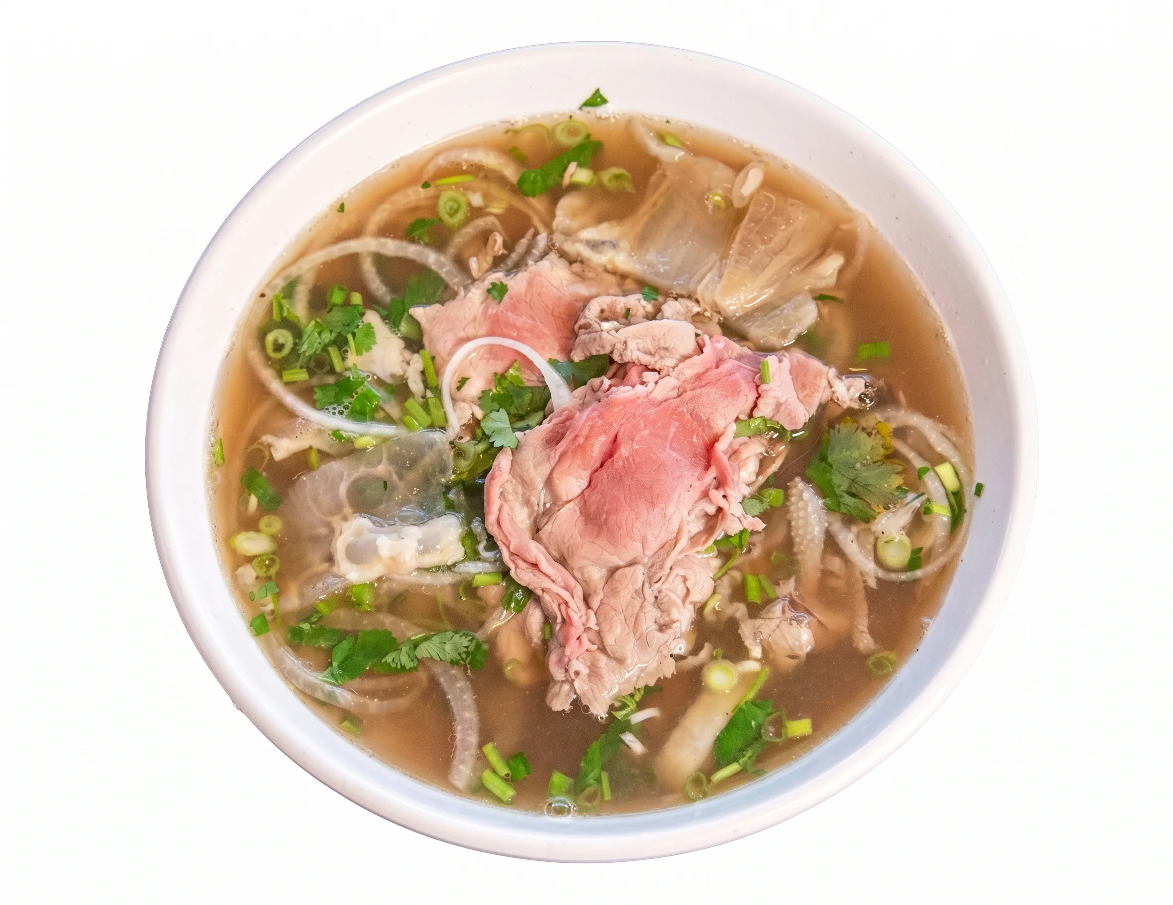 Bowl of pho with beef, herbs, and green onions.