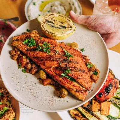 A beautifully arranged plate of gourmet food with vibrant colors.