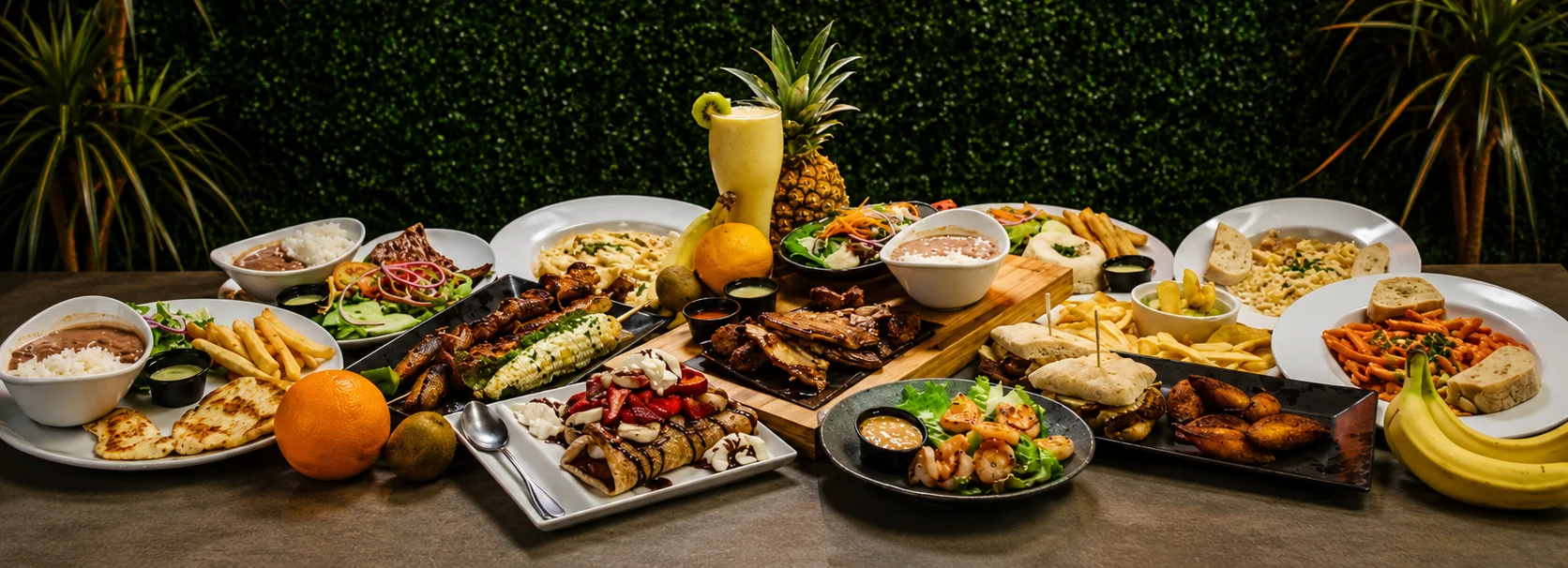 Assorted Latin American dishes with vibrant sides and desserts