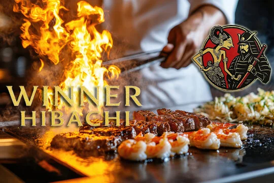 Japanese hibachi grill with sizzling shrimp and steak