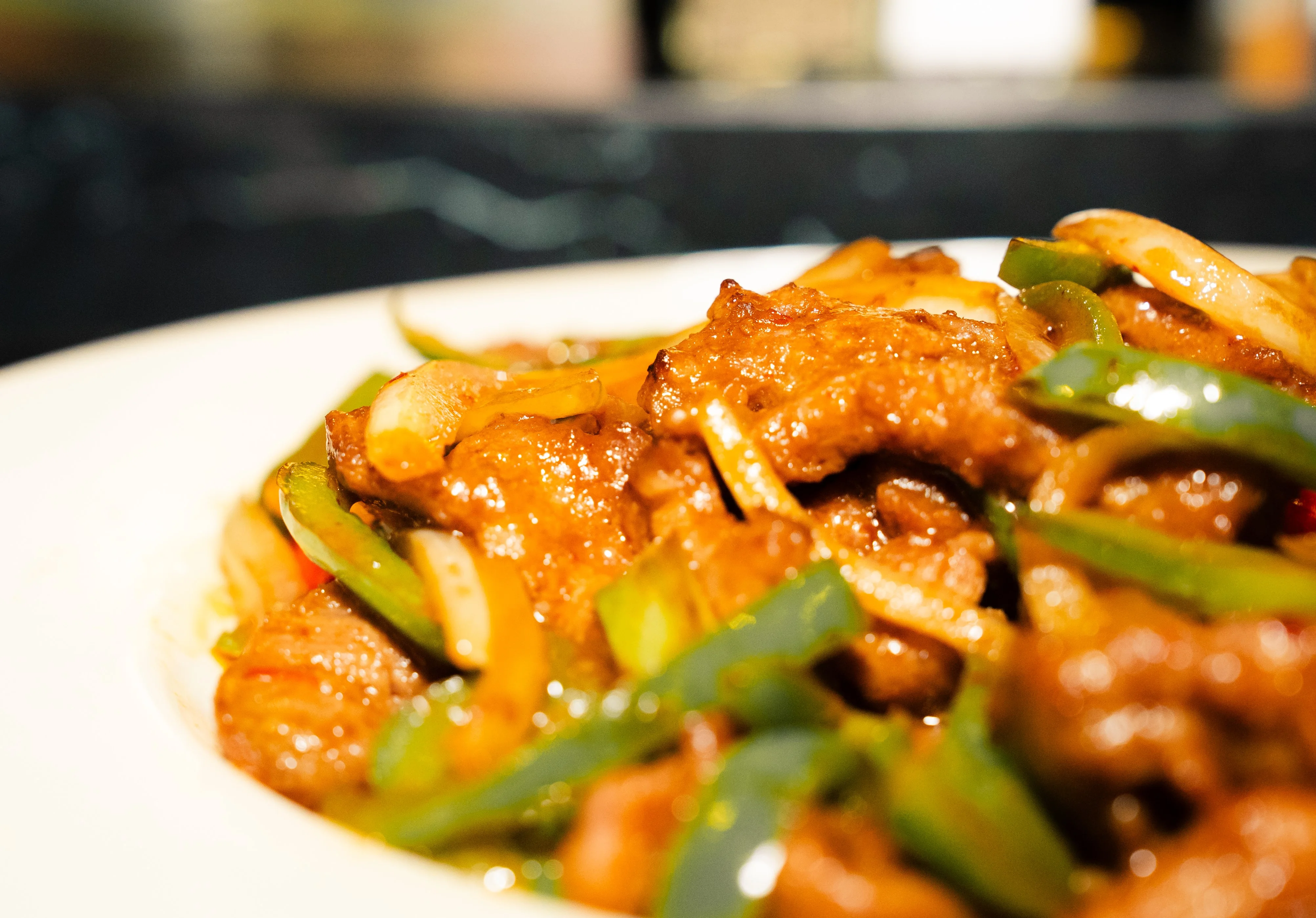 Sizzling Chinese beef stir-fry with bell peppers