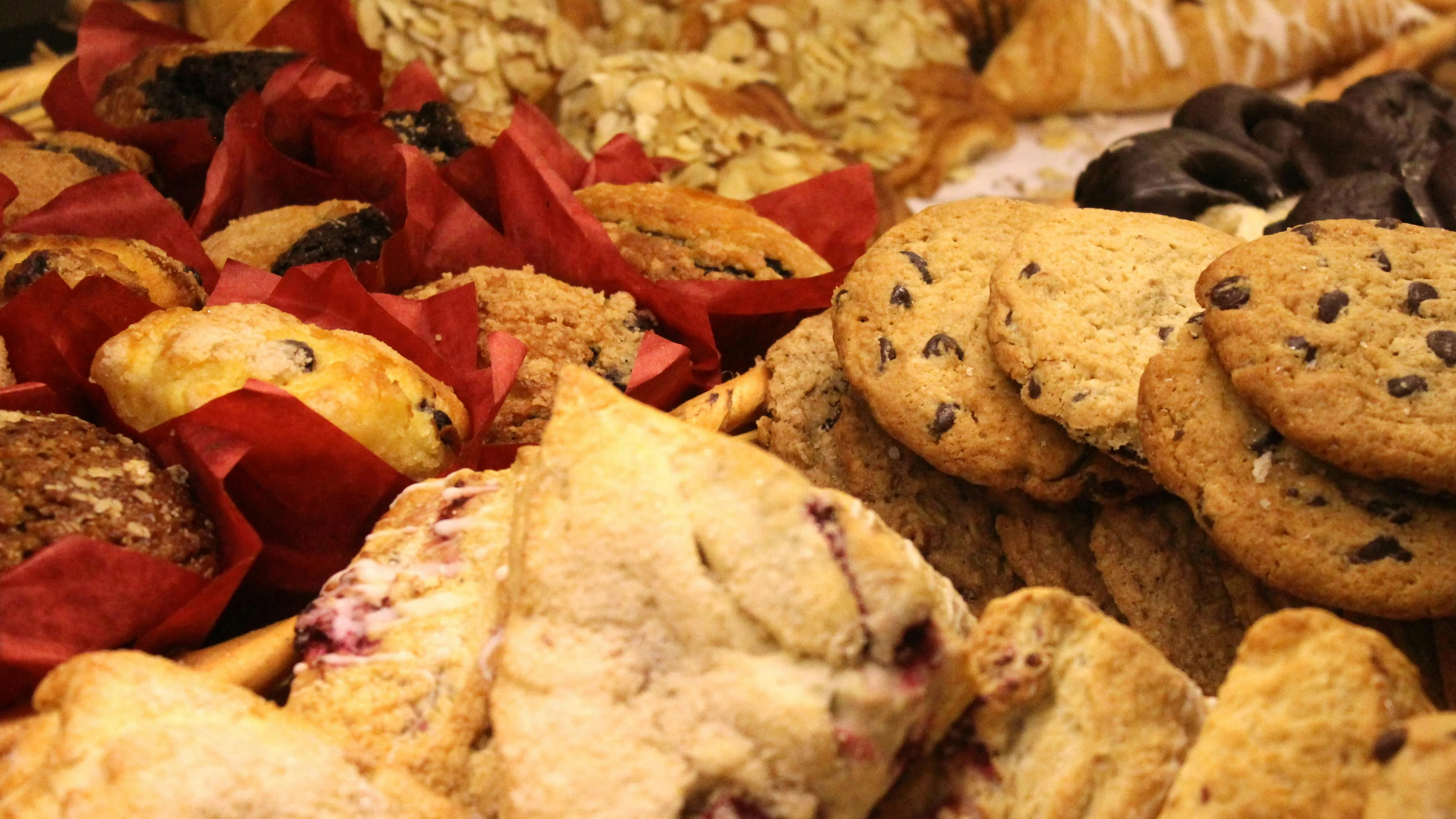 Assorted pastries and cookies in a bakery display