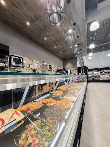 Modern restaurant interior showcasing a variety of Asian-inspired dishes