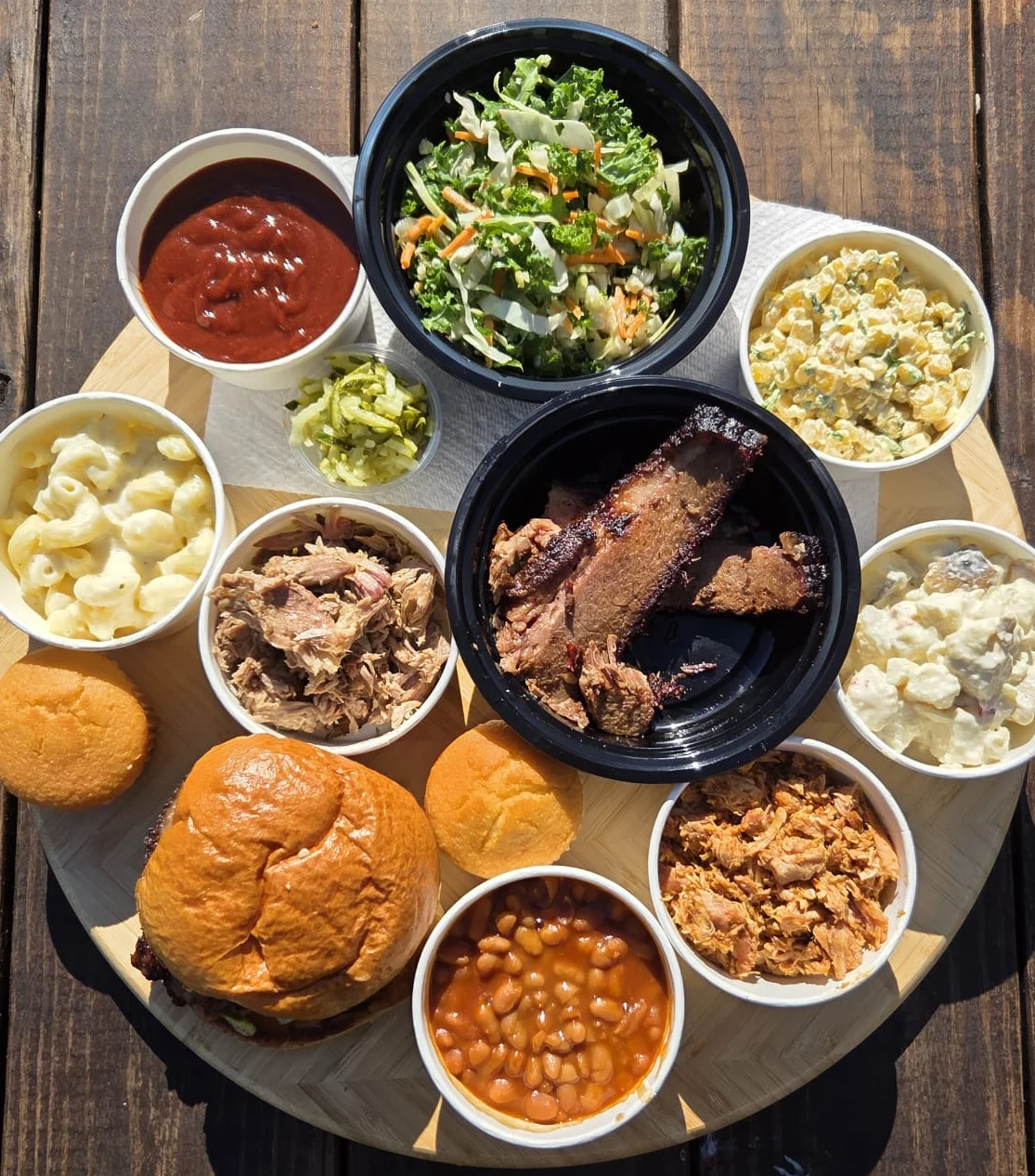 Southern barbecue platter with pulled pork and sides