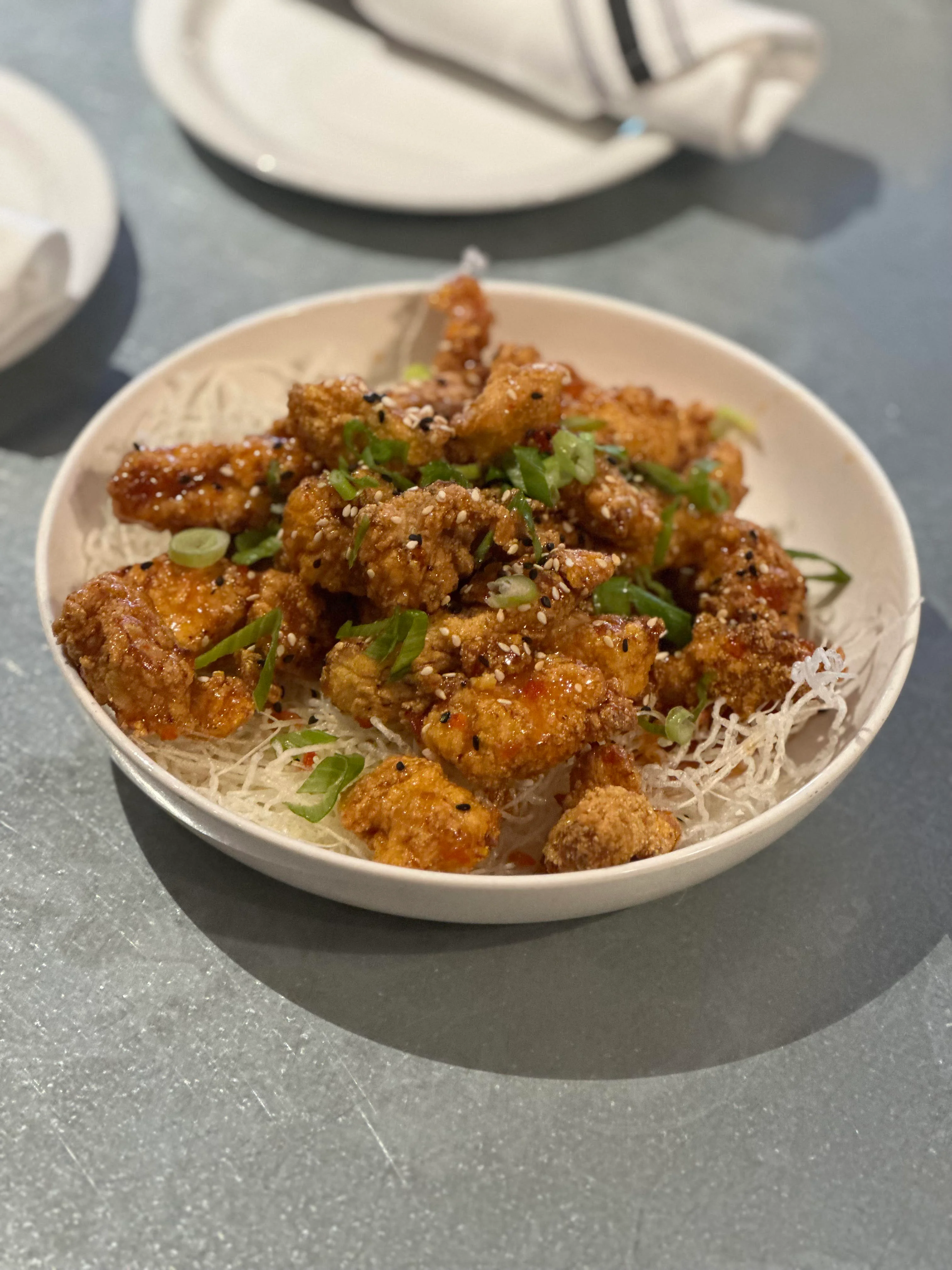 Crispy Korean fried chicken with sesame and scallions