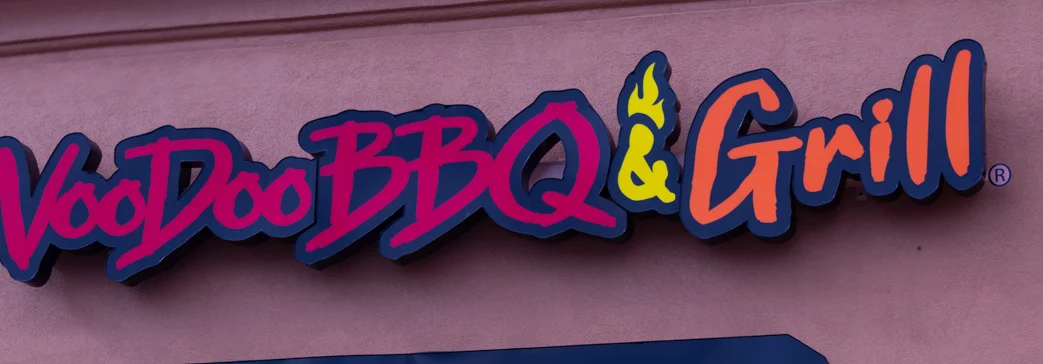 VooDoo BBQ & Grill storefront sign at our Pensacola location on 9 Mile Road.