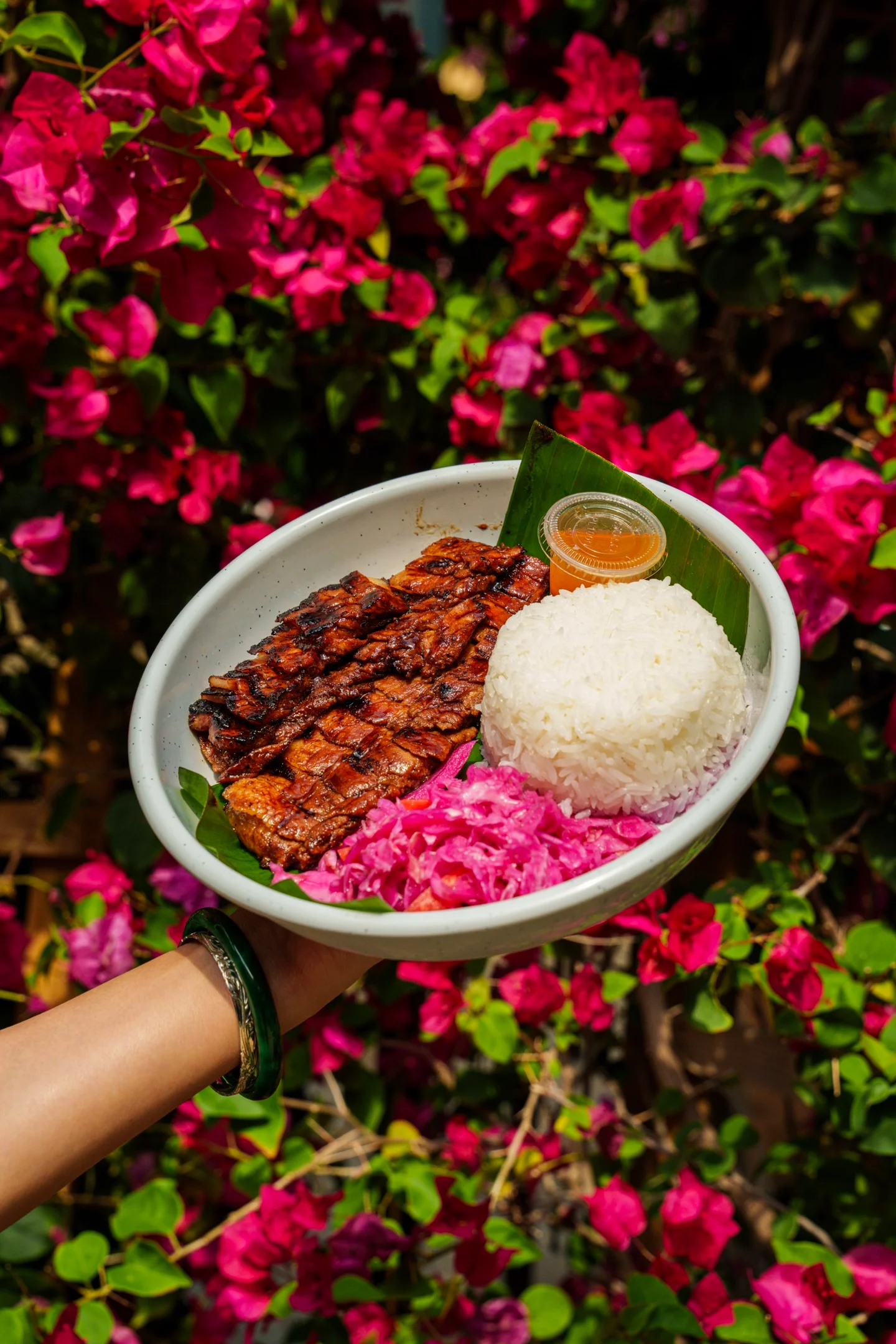 Grilled Indonesian satay with rice and pickled vegetables