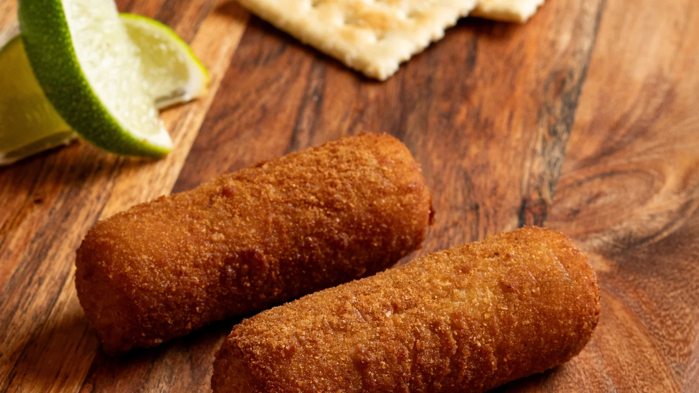 Crispy Colombian arepas with dipping sauce