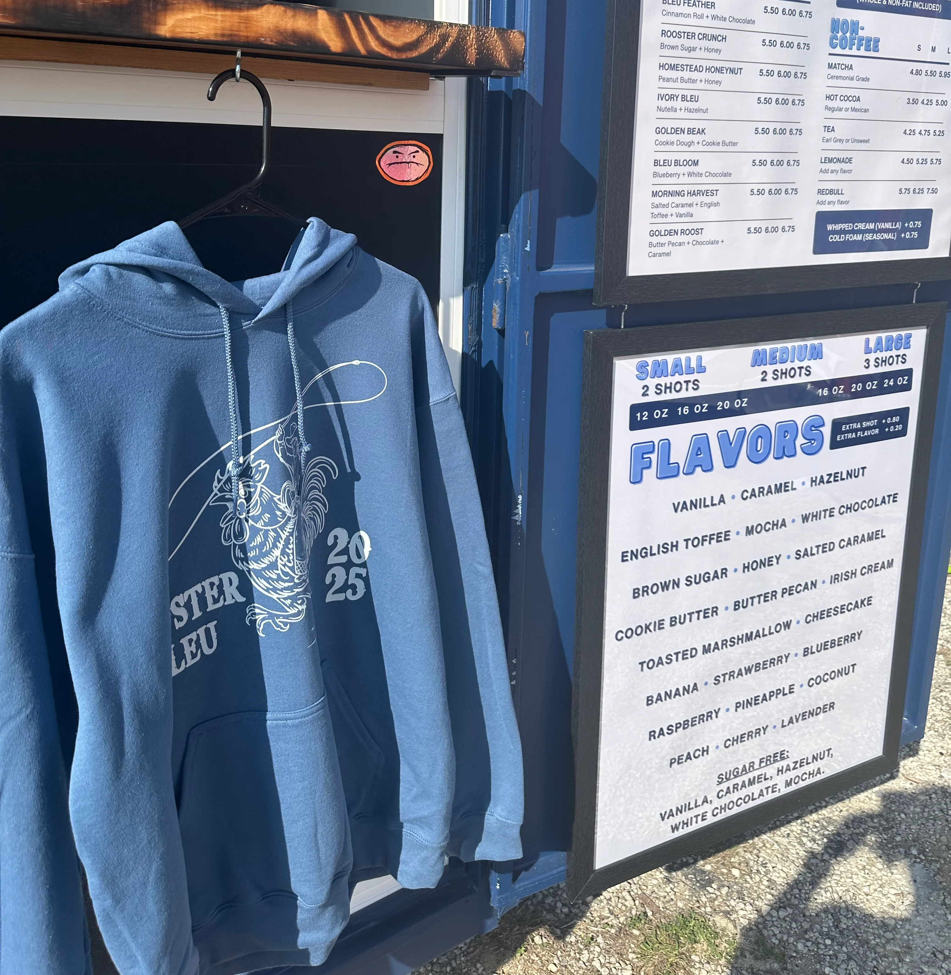 Coffee truck menu with flavors and merchandise display