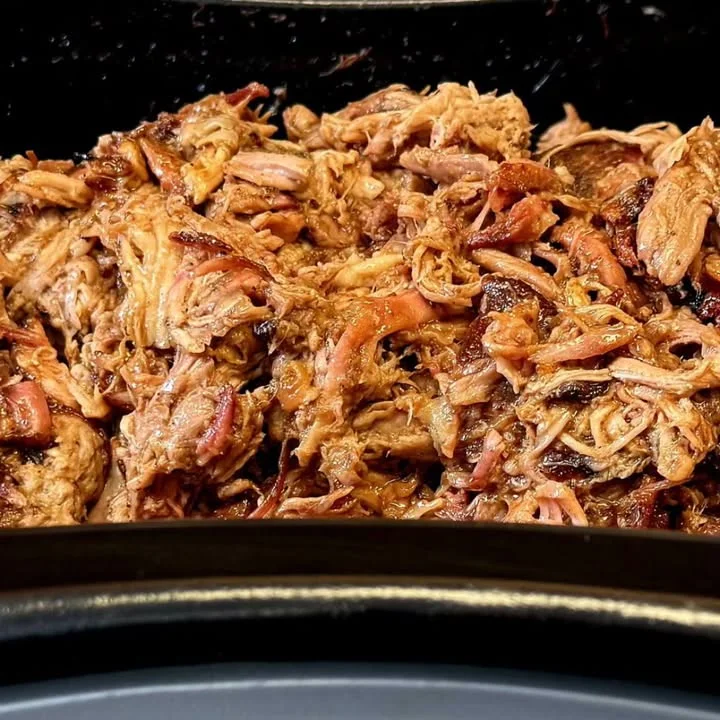 Pulled pork barbecue served in a rustic style