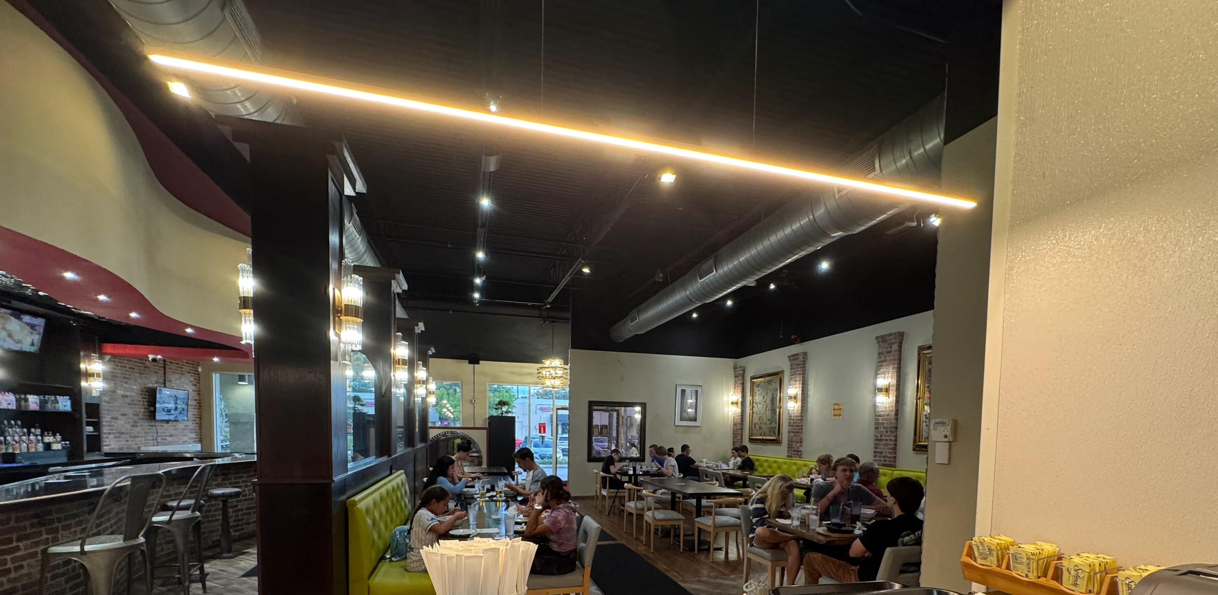 Cozy restaurant interior with modern decor and warm lighting