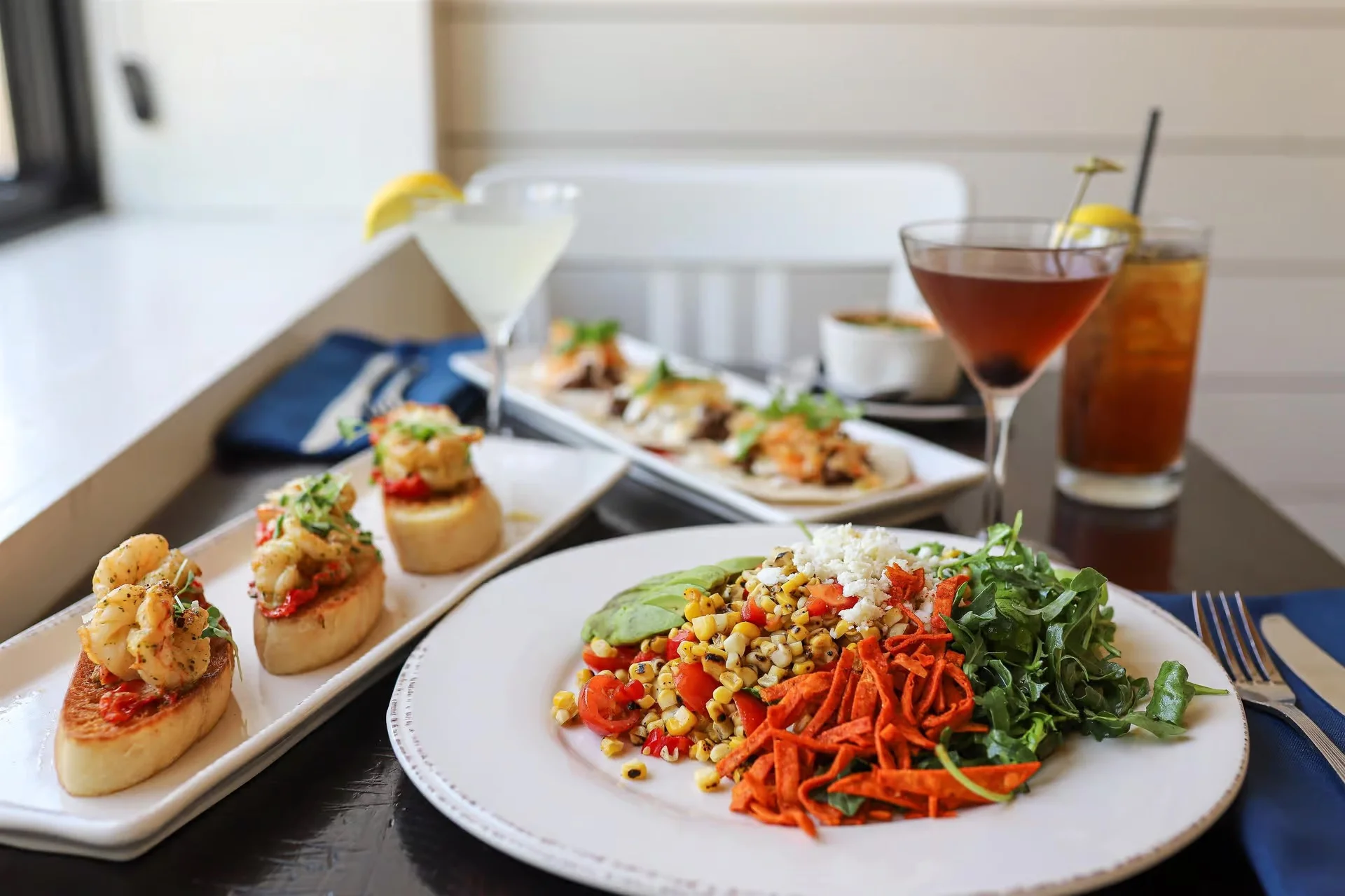 Colorful Mexican salad with shrimp tostadas