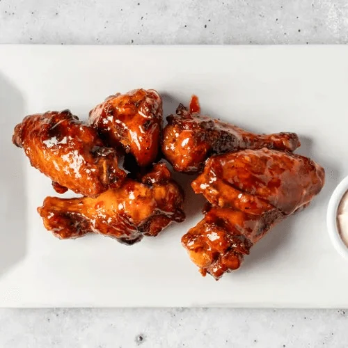Crispy buffalo chicken wings with dipping sauce