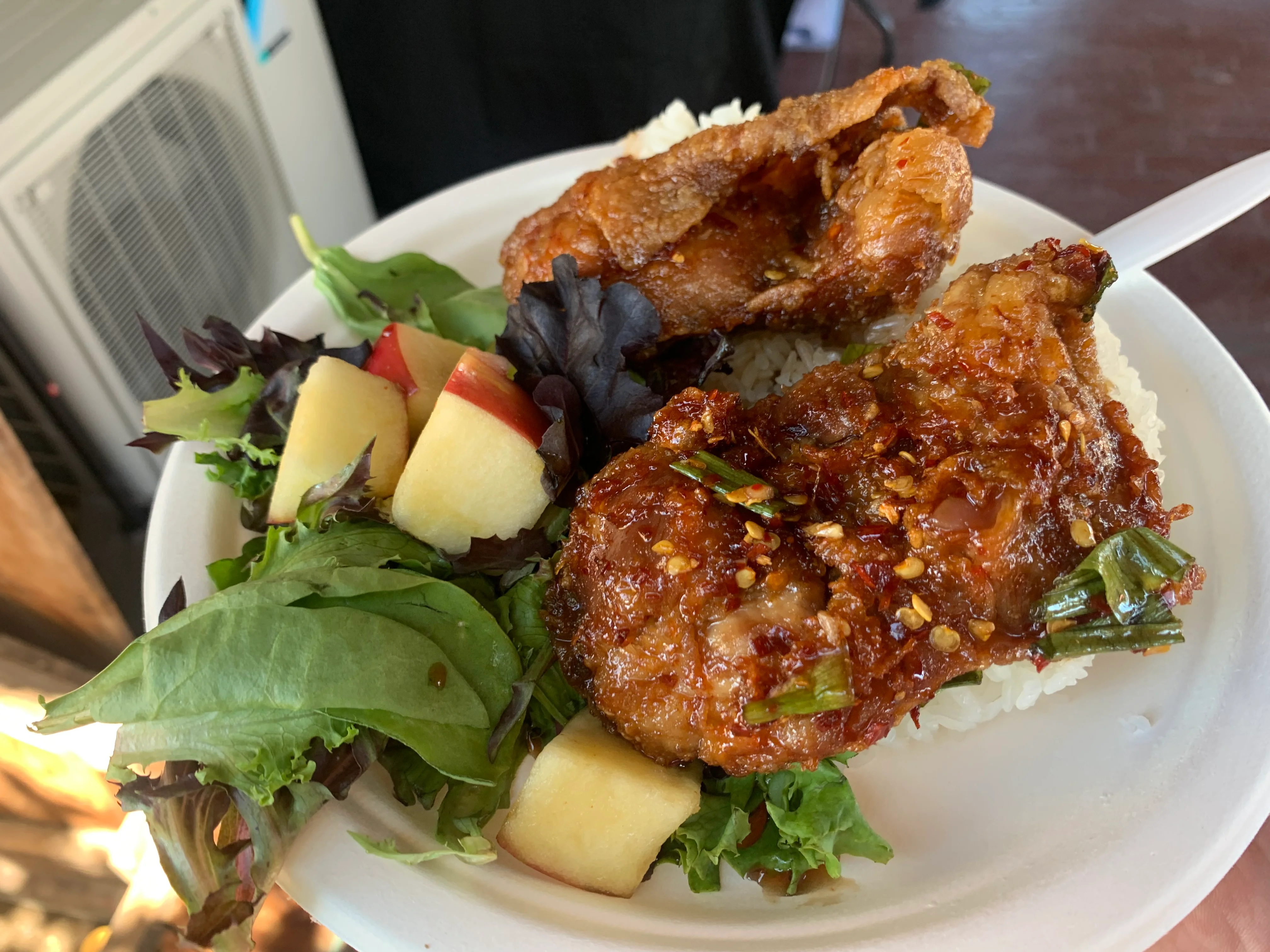 Crispy Korean fried chicken with salad and rice