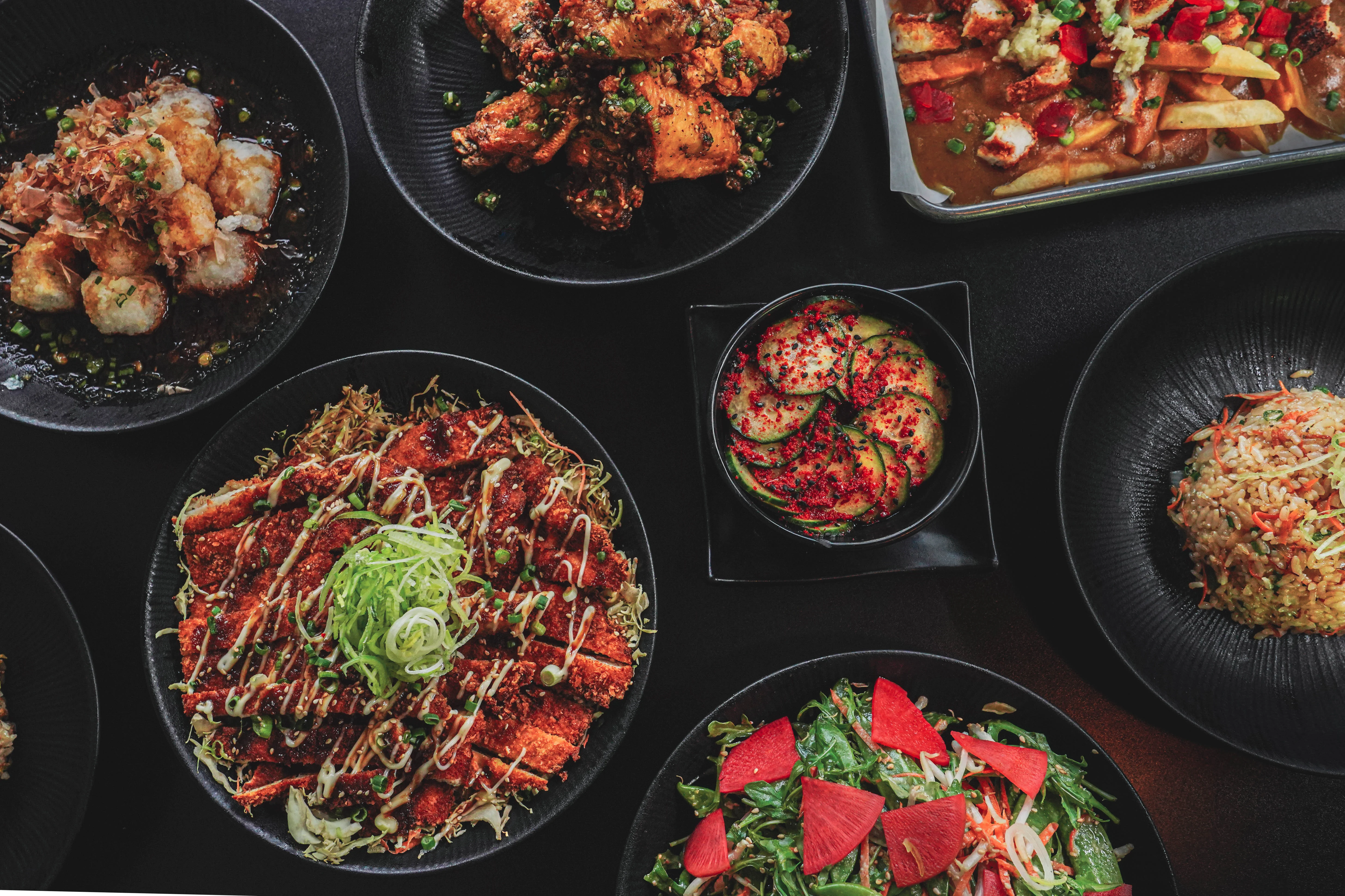 Assorted Asian dishes including fried chicken and rice
