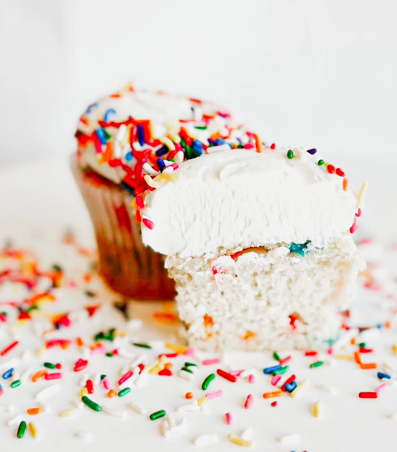 Colorful birthday cupcake with sprinkles