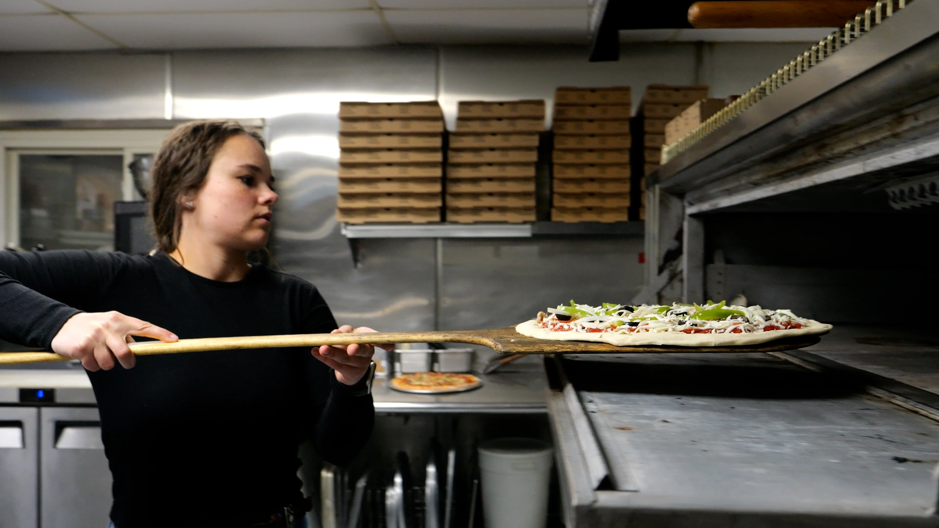A restaurant chef preparing a dish