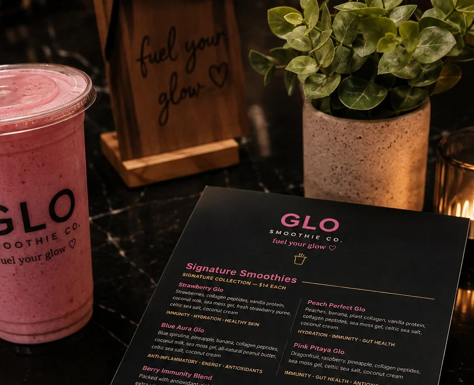 Menu of signature smoothies and cold brews at a smoothie bar
