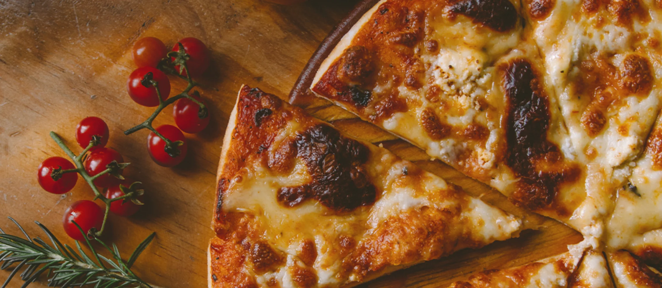 Delicious Margherita pizza on a wooden board