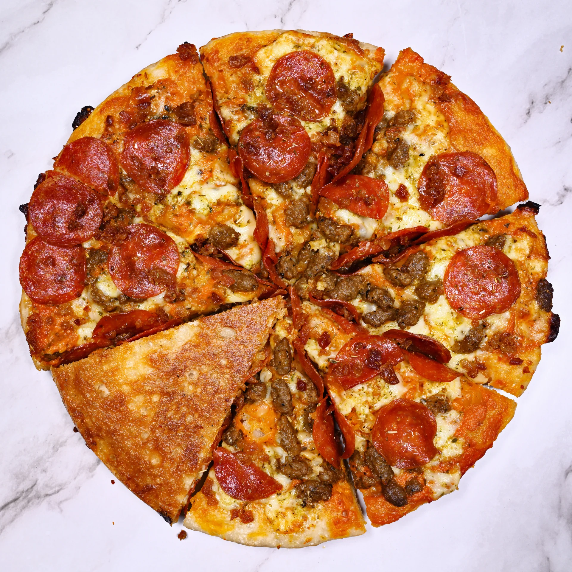 "The Penny" - Our take on a classic Meat Lovers with pepperoni, bacon, sausage, and roasted pork.