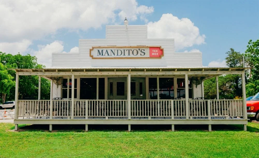 Charming Tex-Mex restaurant exterior with porch seating
