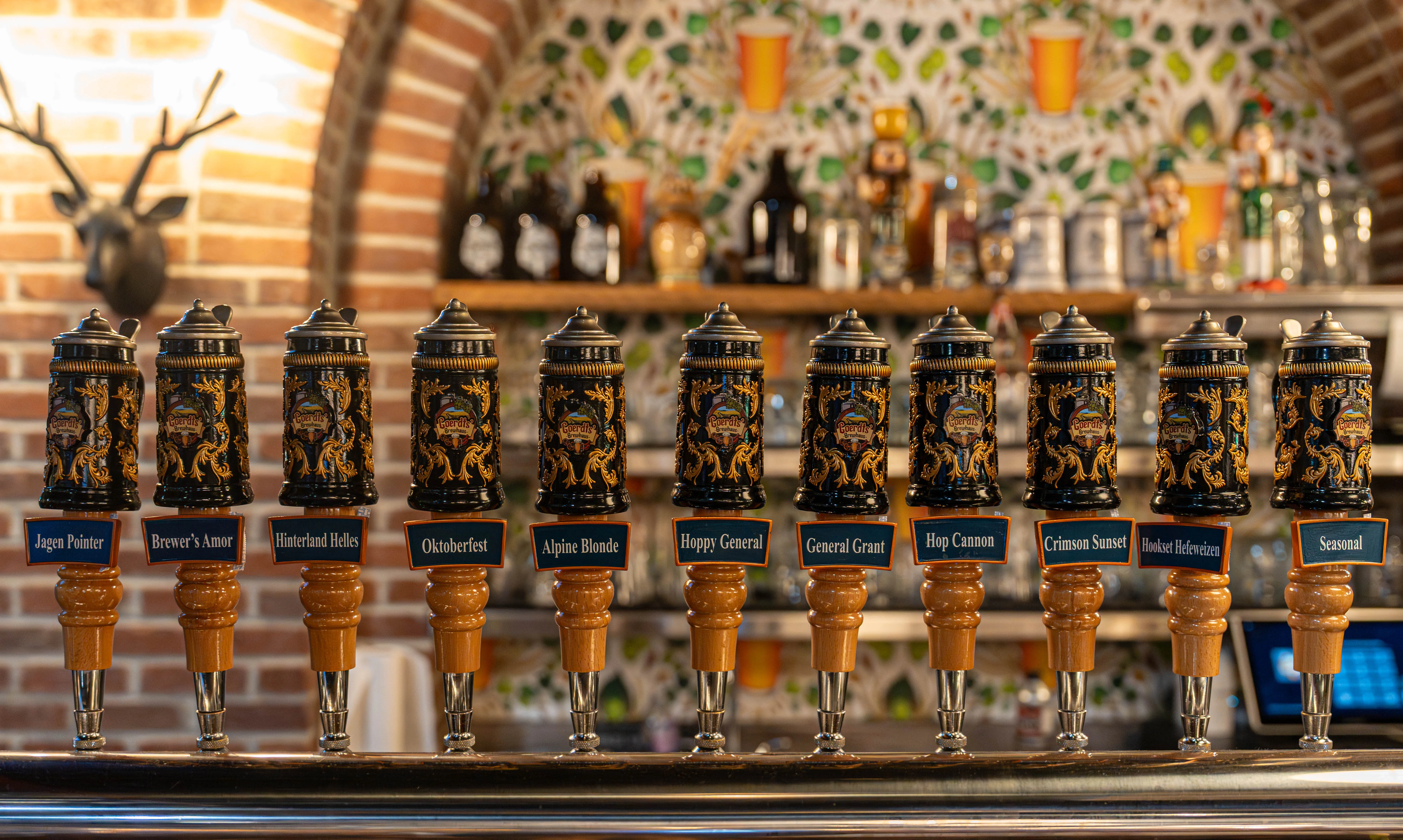 Craft beer taps featuring various brews in a rustic bar setting