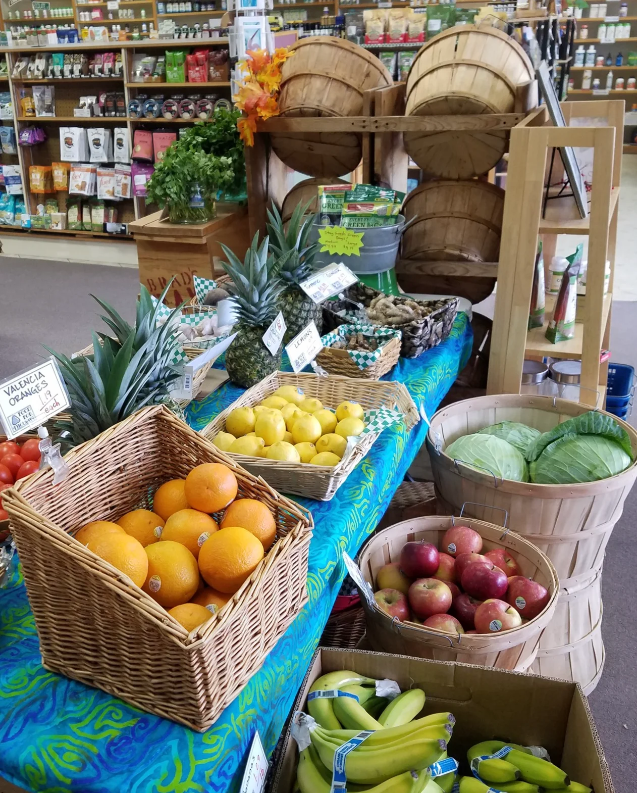 Fresh produce display in a local market with fruits and vegetables
