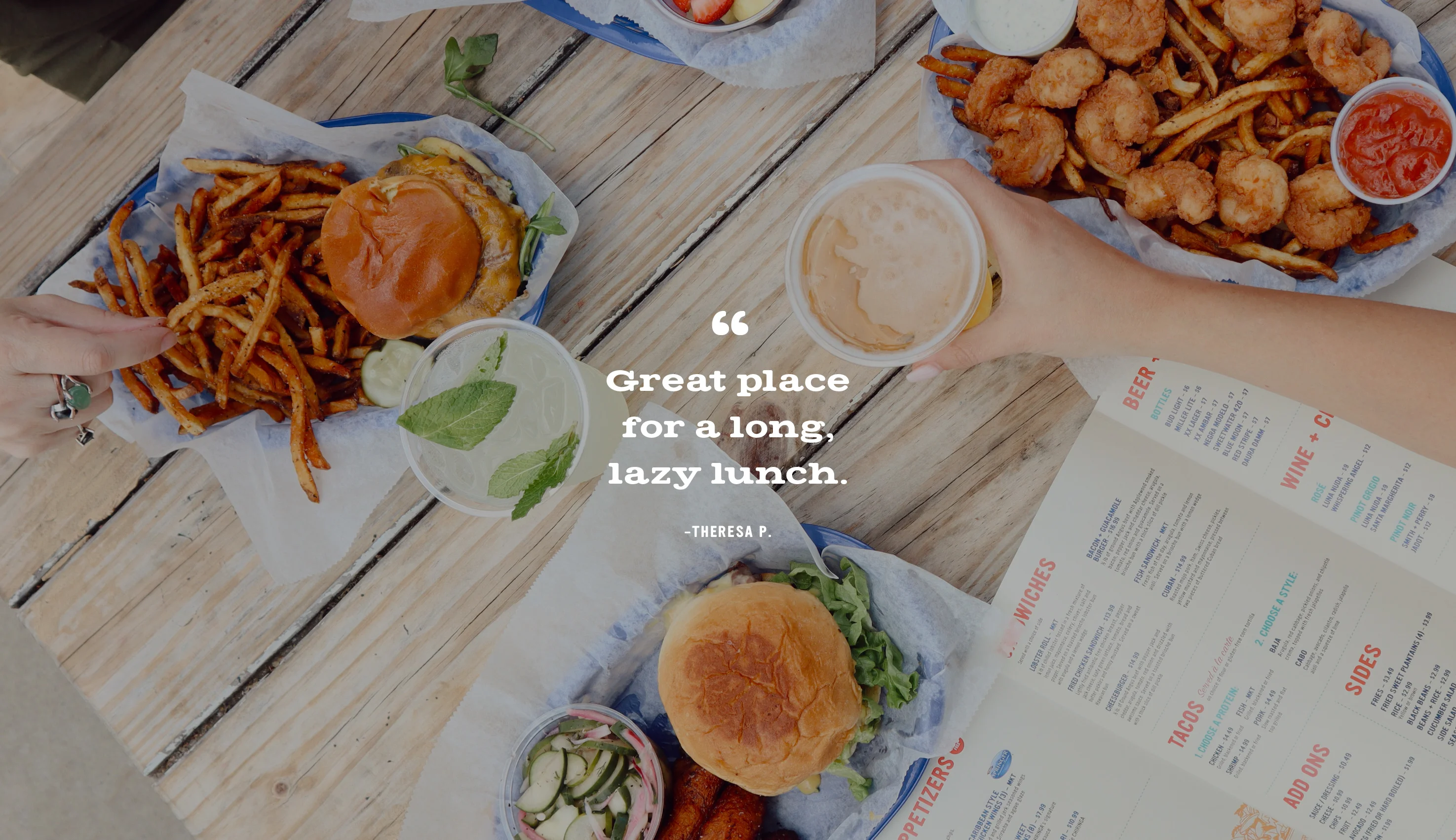 A top down view of delicious food and drinks. "Great place  for a long, lazy lunch."