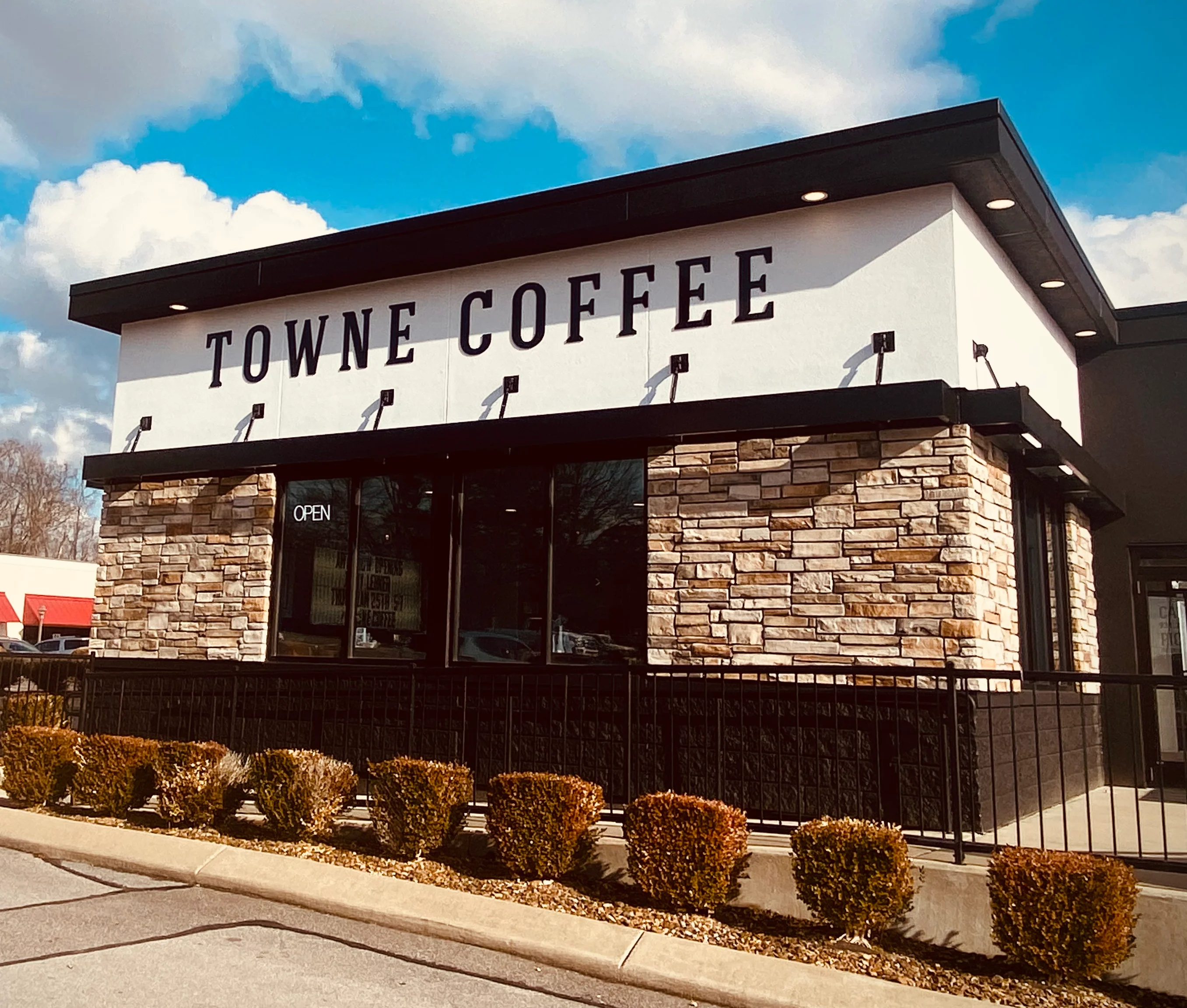 Exterior view of Towne Coffee shop with modern design