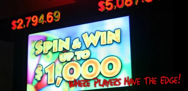 Colorful gaming sign promoting Spin & Win up to $1,000