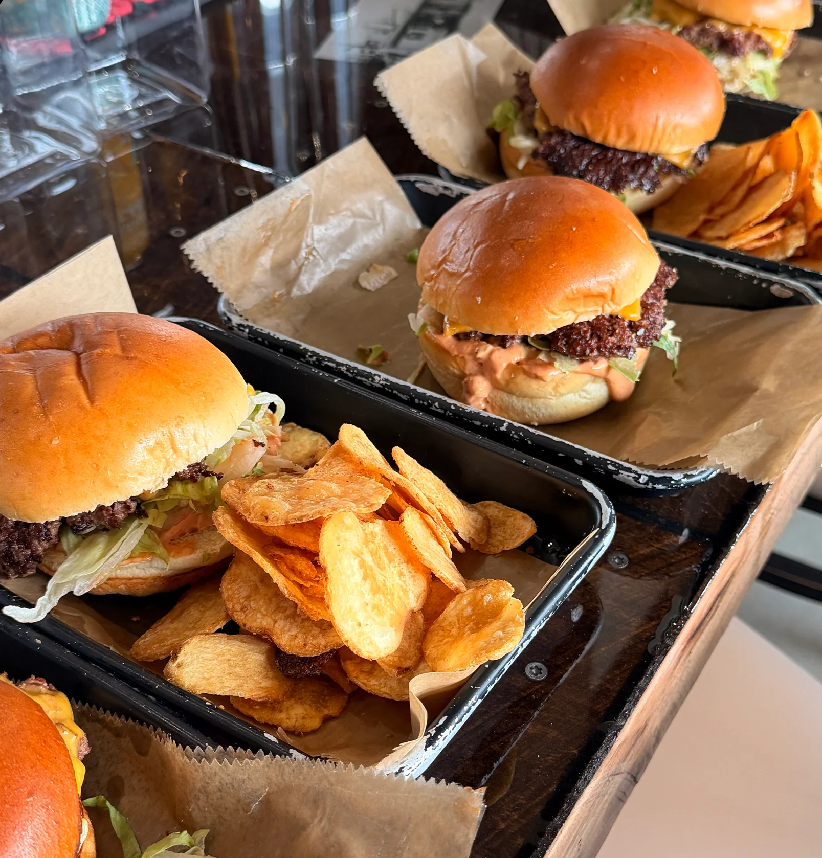 Delicious sliders with crispy chips in a casual dining setting