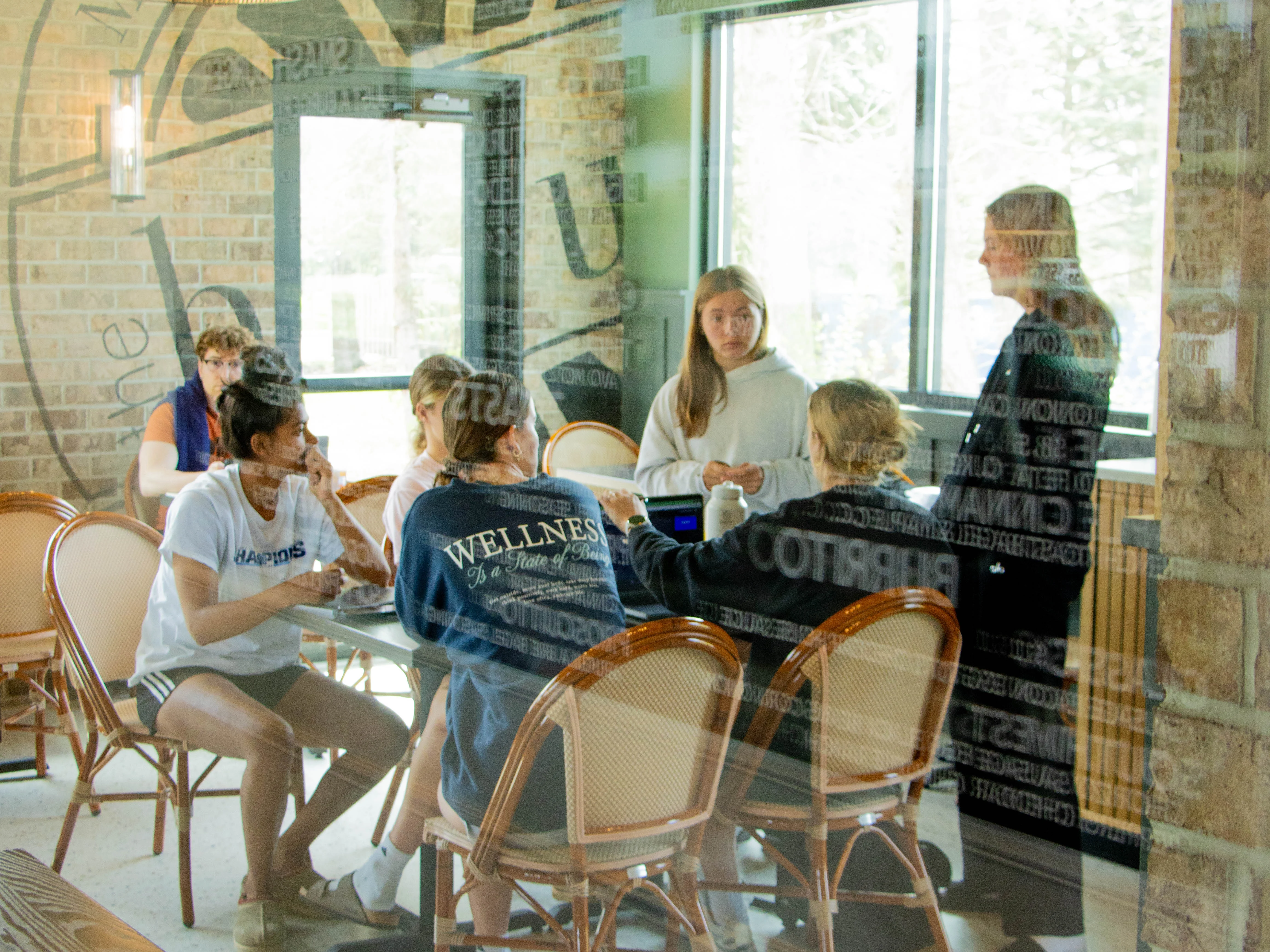 A group of people sitting together and talking in The Borough