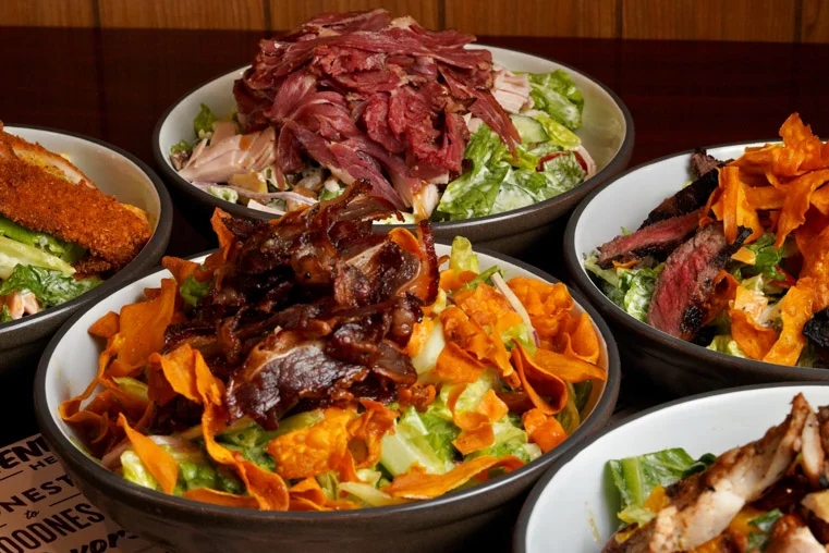 Assorted BBQ meat salads in bowls