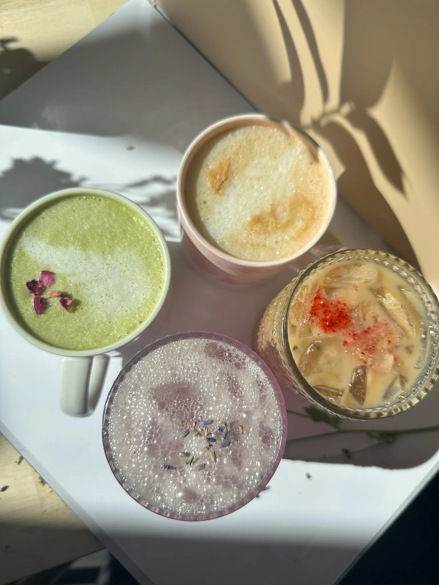 Variety of colorful specialty drinks on a table