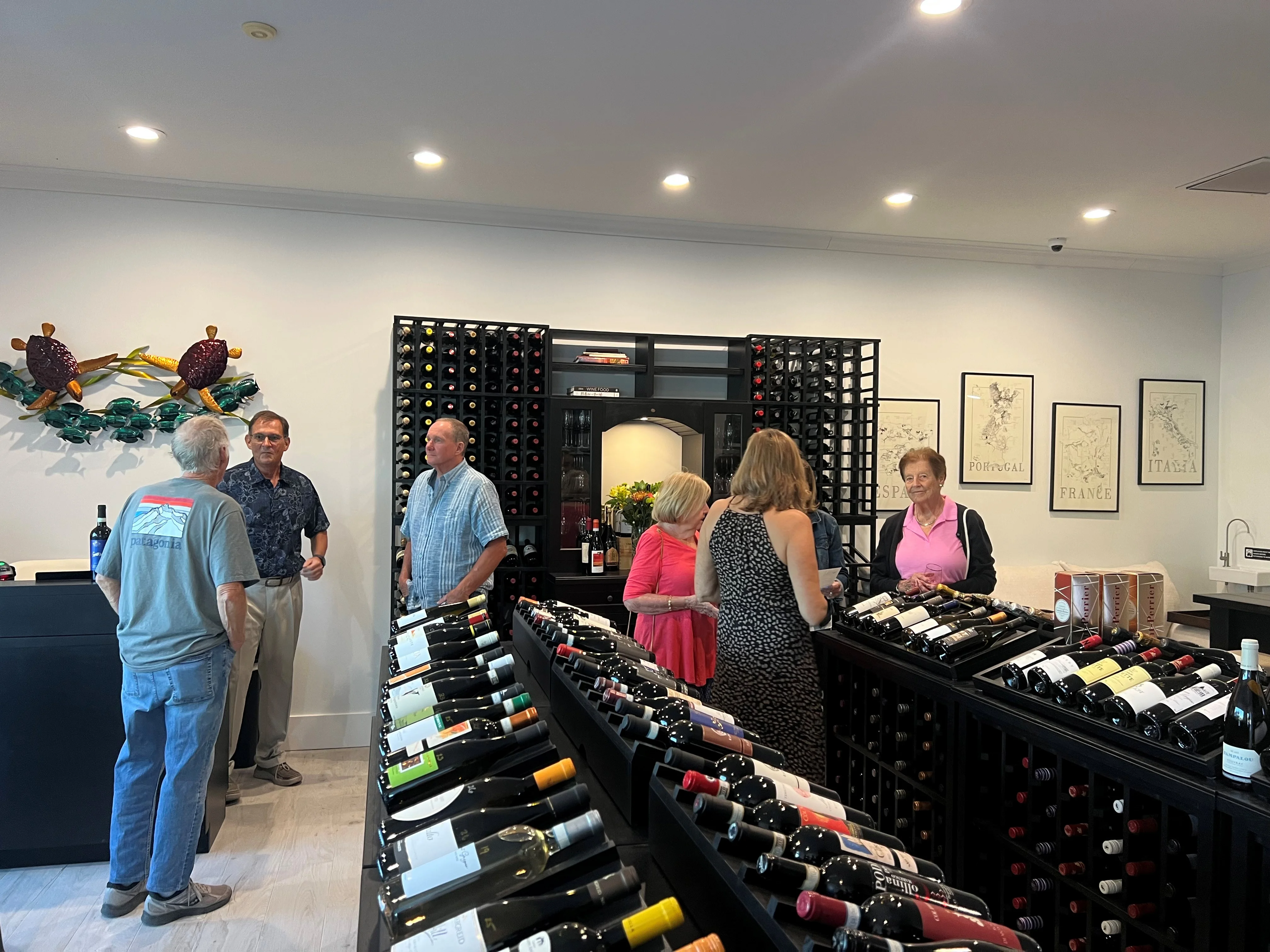 Wine tasting event in a modern wine shop with diverse selections
