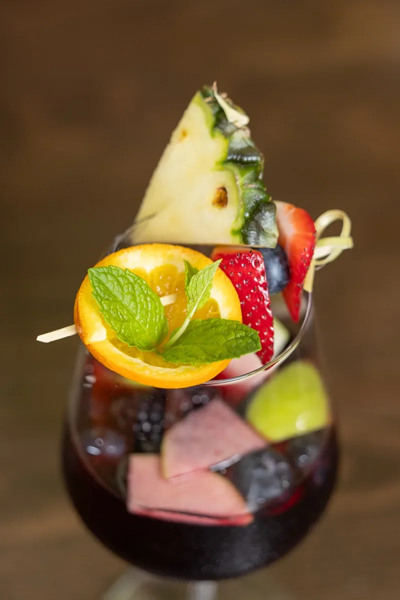 Colorful sangria cocktail with fresh fruit garnish