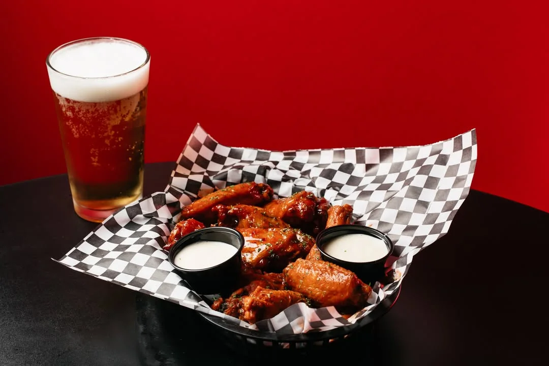 Crispy buffalo chicken wings with dipping sauces