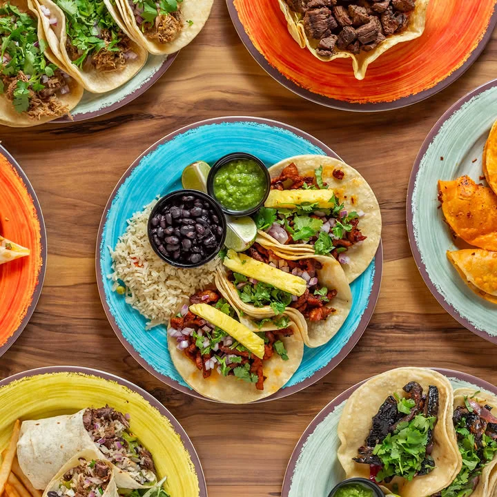 Sizzling vegetable fajitas served on a hot plate