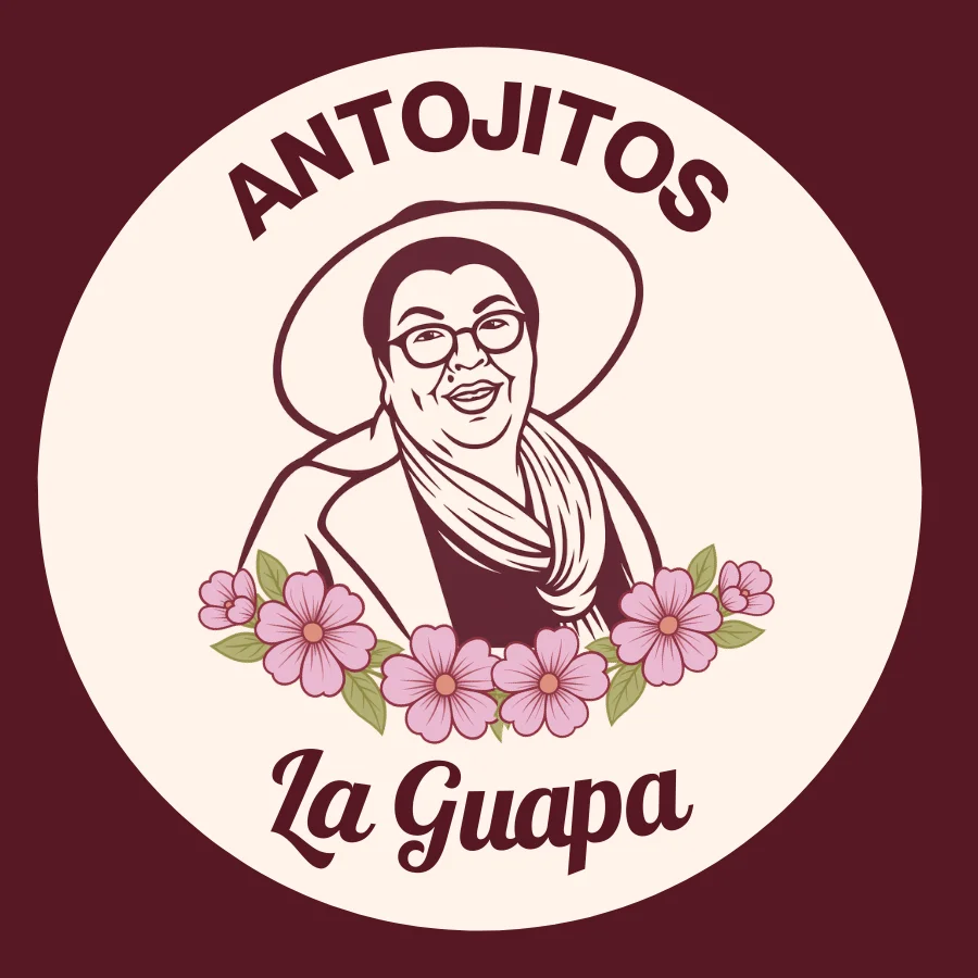 Logo of Antojitos La Guapa featuring a smiling woman and floral design