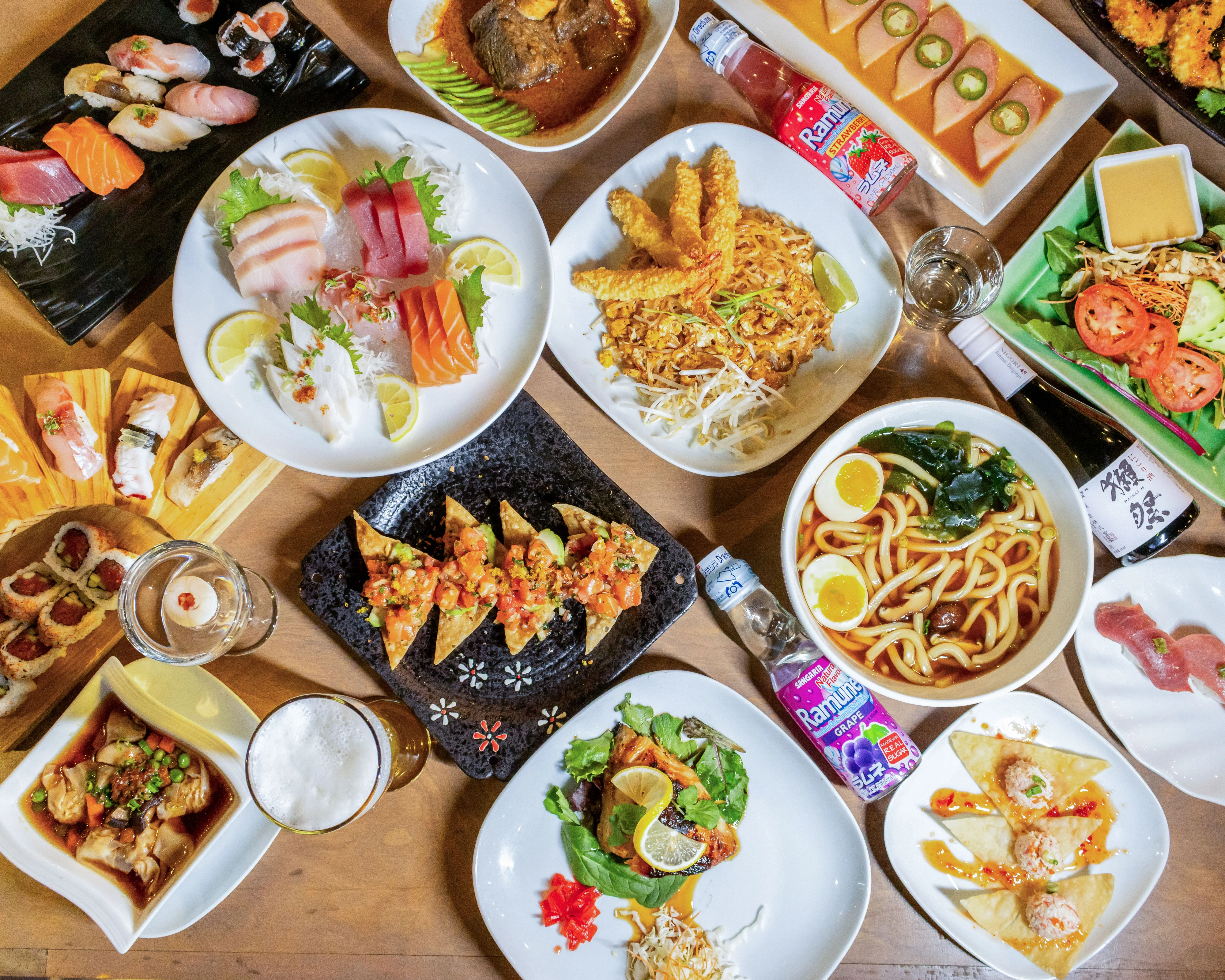 Assorted Japanese sushi and sashimi platter with noodles and tempura at Ginza Japanese Restaurant located at 5868 San Felipe Street, Houston, TX 77057