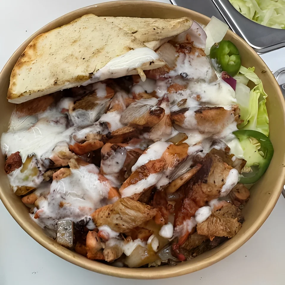 Delicious gourmet burger with fresh toppings on a wooden table