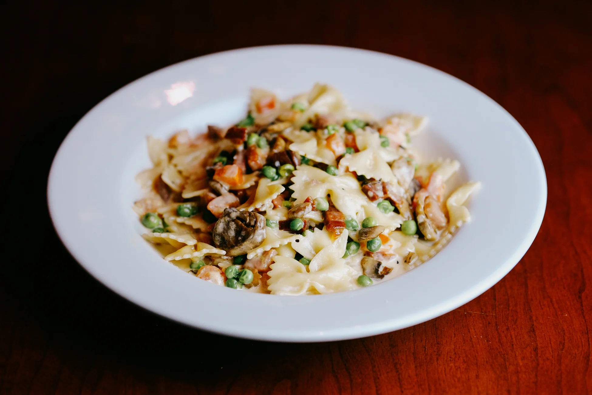 Creamy Italian farfalle pasta with vegetables