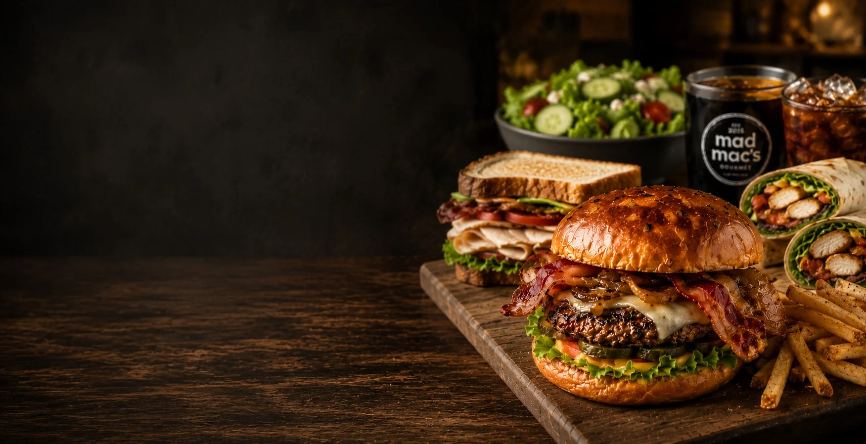 Gourmet bacon cheeseburger with fries