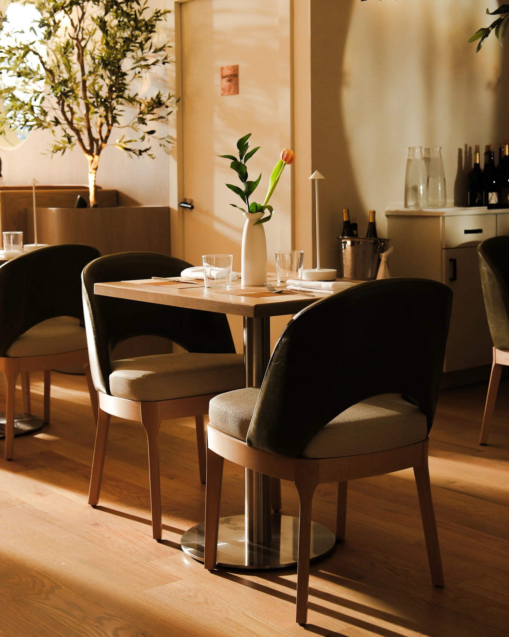 Delicious gourmet burger with fresh toppings on a wooden table