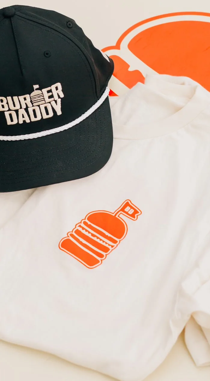 Burger-themed apparel featuring a cap and t-shirt
