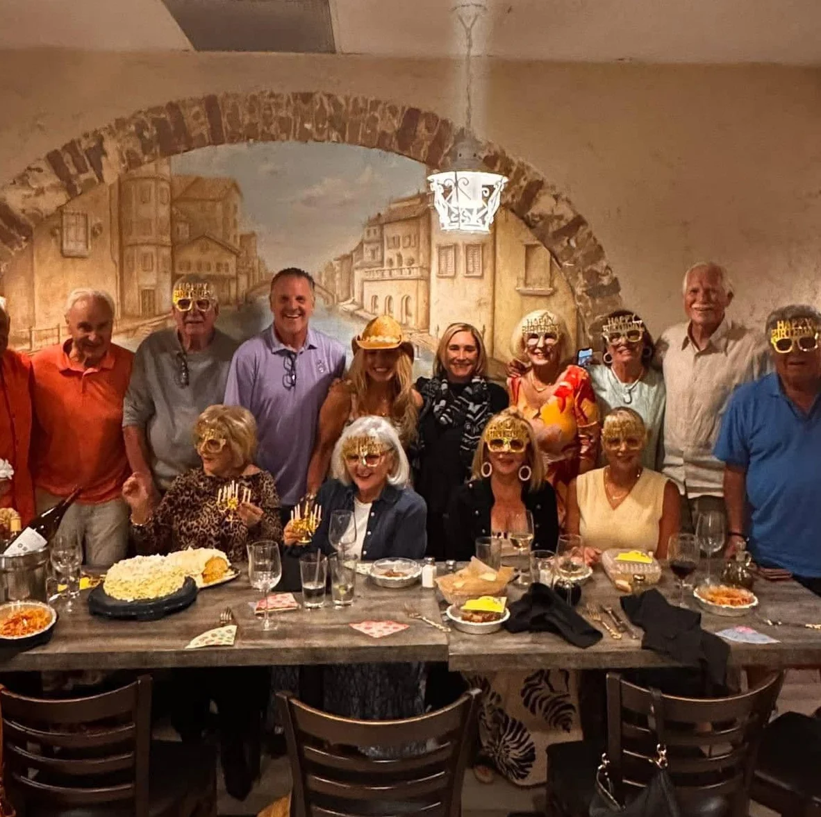 Group celebration in a cozy restaurant with festive decor