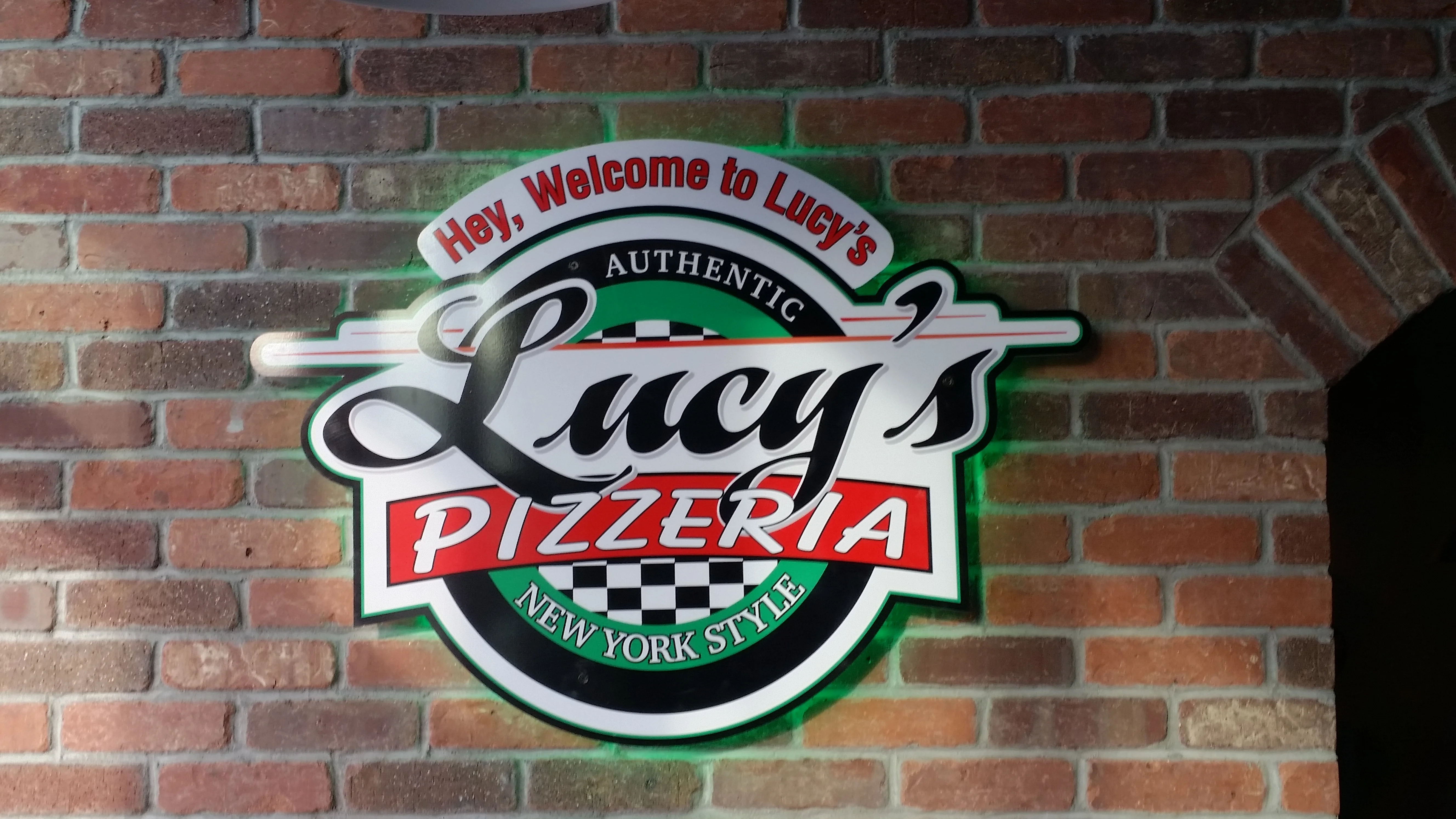 back lit Lucy's logo