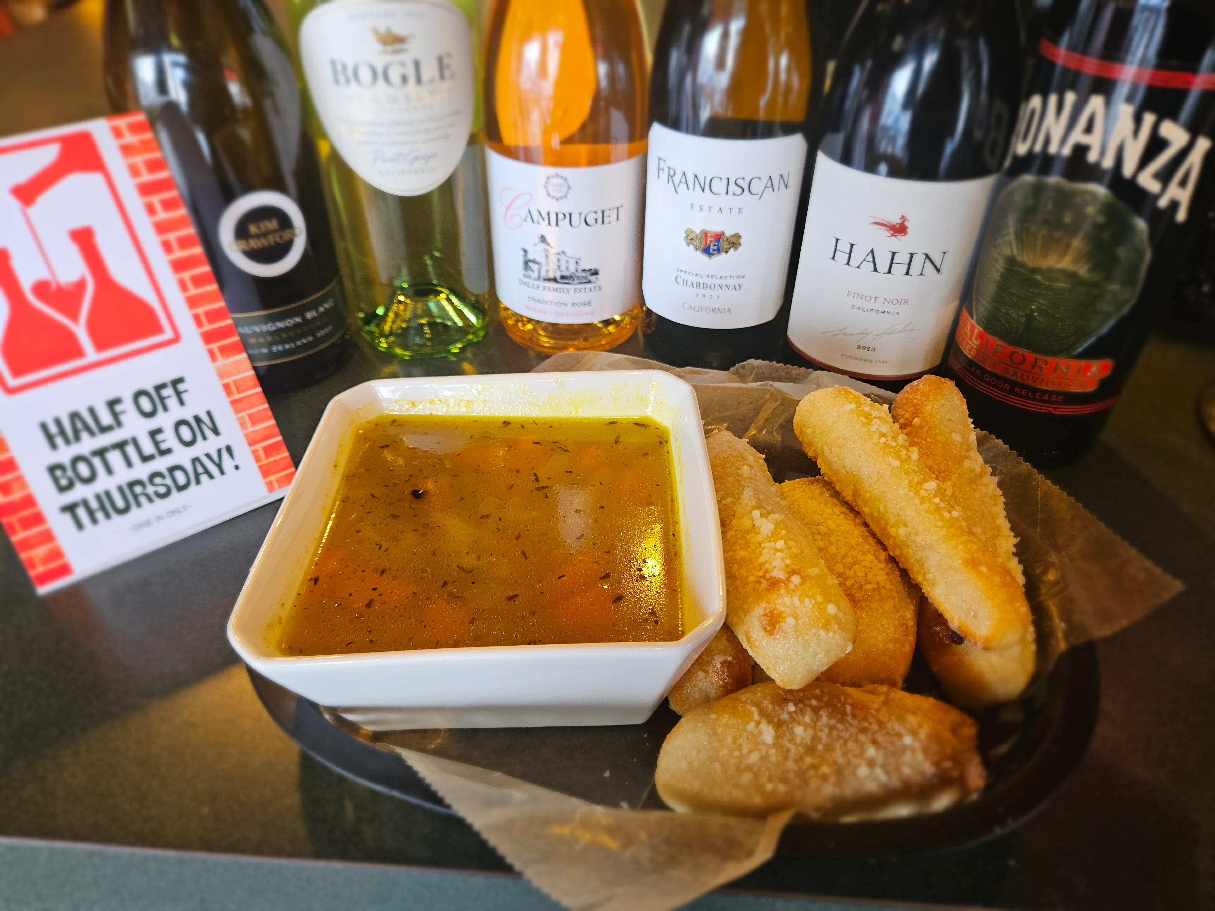 Savory Italian minestrone soup with breadsticks